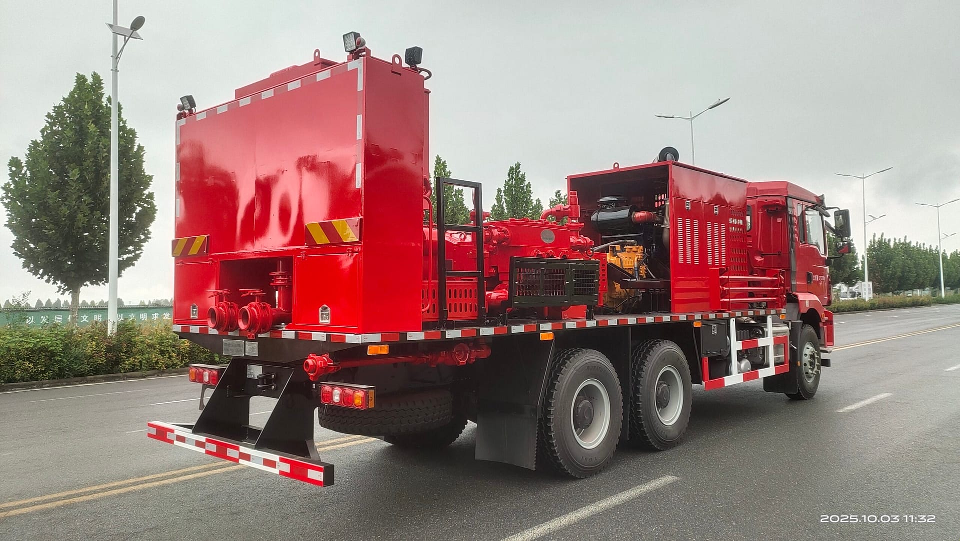 Rear-right view of cementing truck showing pump system and manifold arrangement