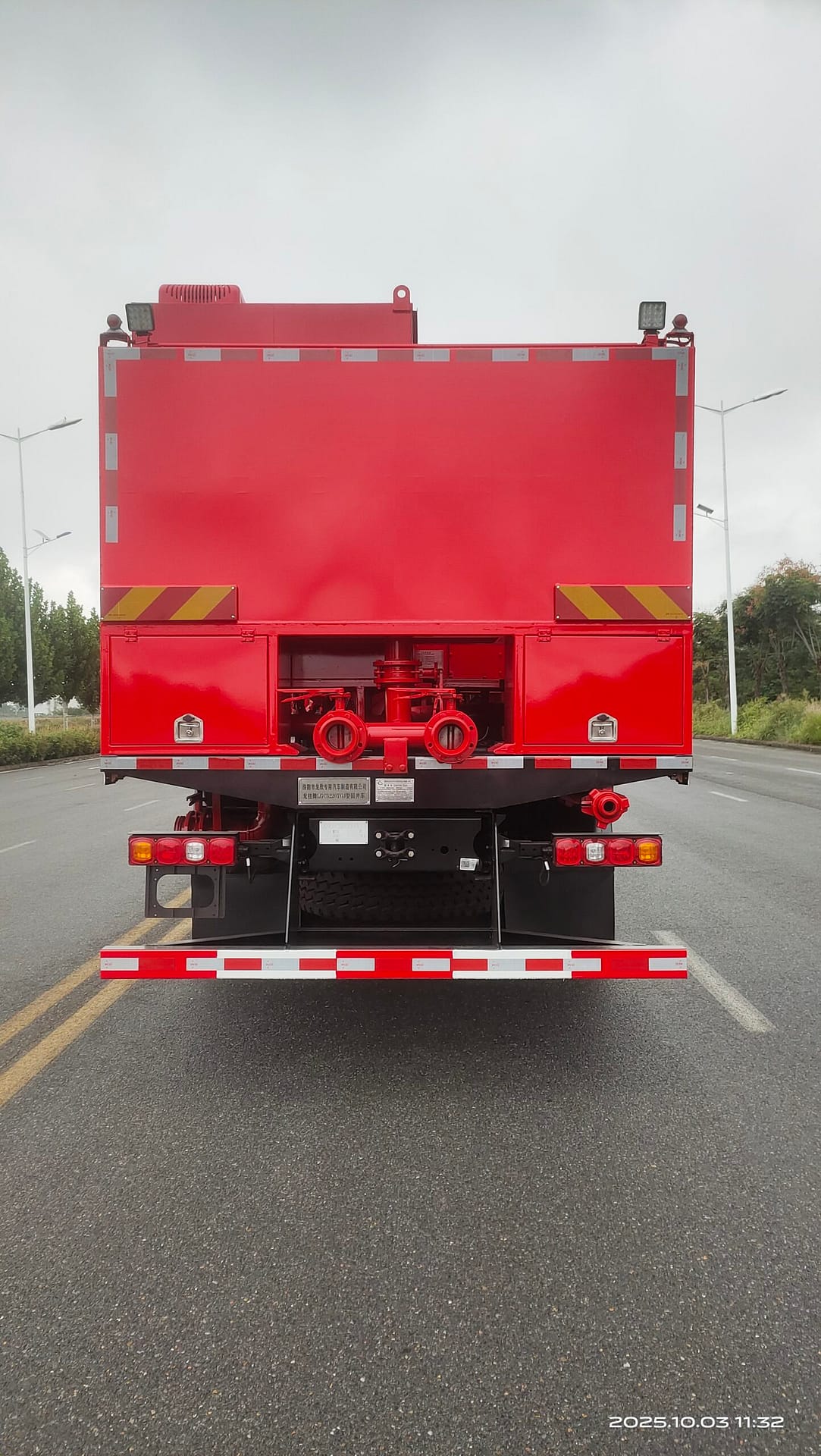 Rear view of cementing truck showing high-pressure pump and manifold details